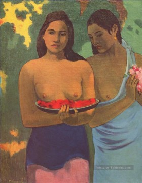 Deux femmes tahitiennes avec des fleurs de mangue Paul Gauguin Peinture à l'huile